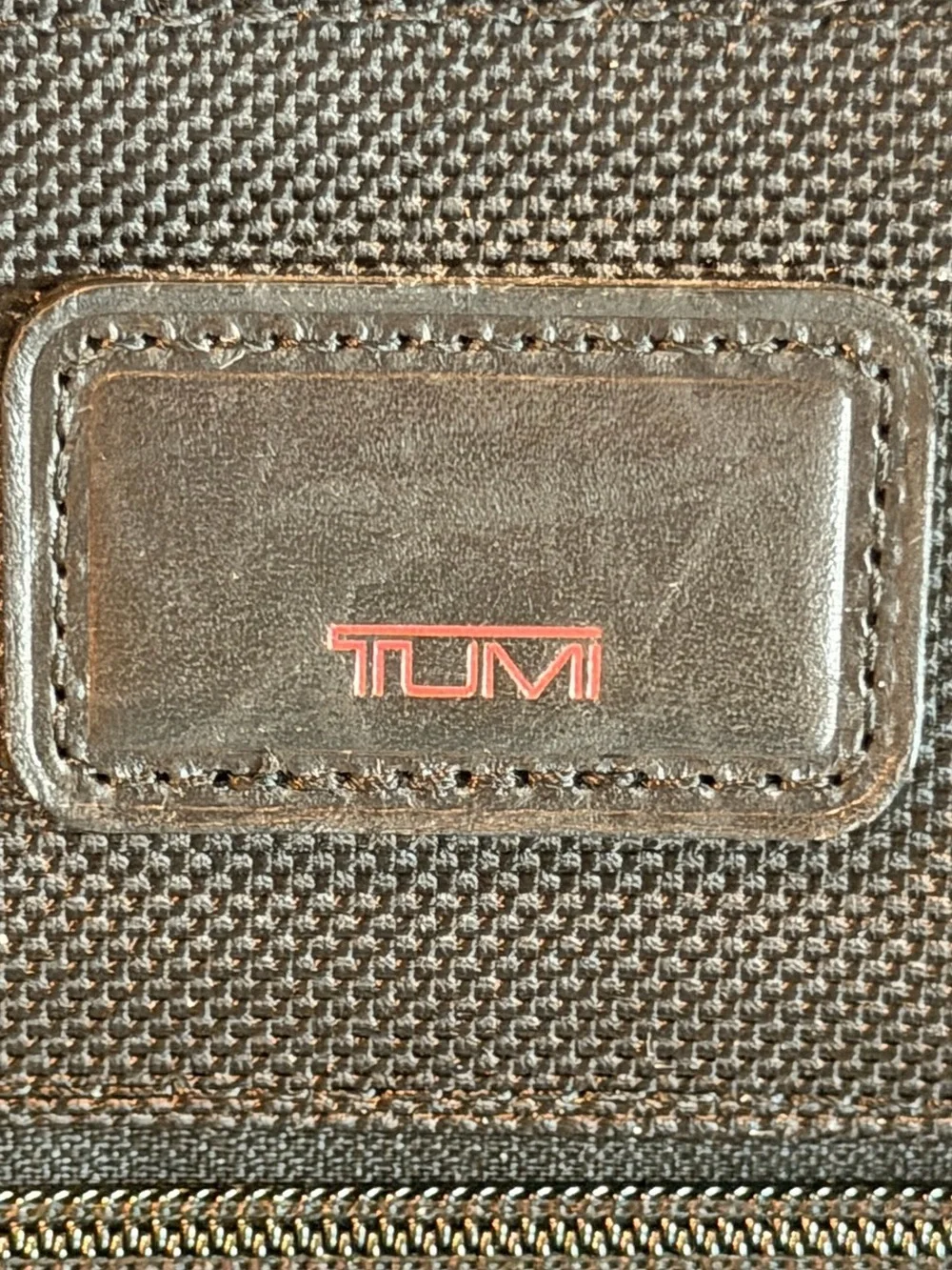 Tumi Black Travel Organizer with Red Logo